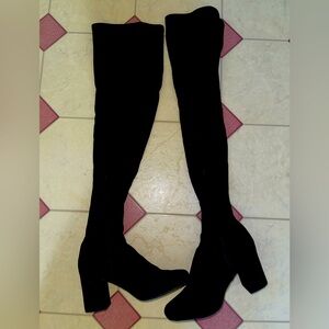 Mid thigh high black boots